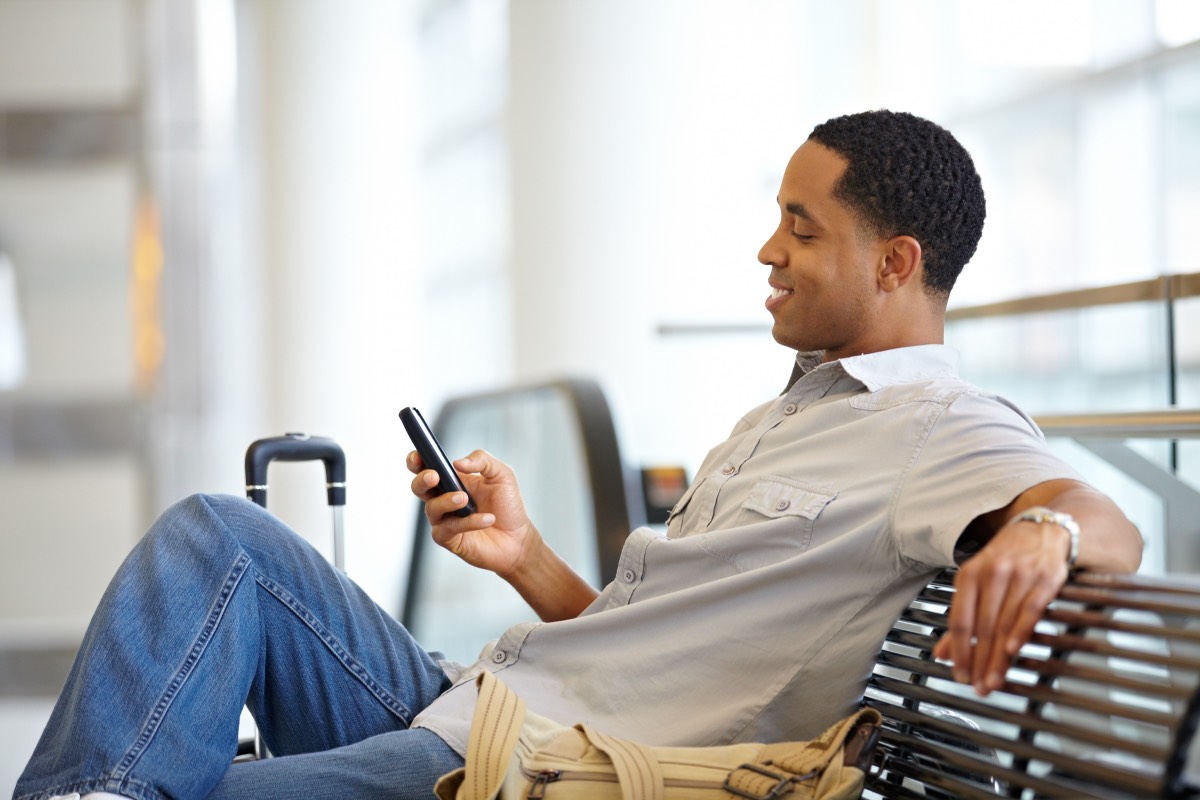 man-using-smartphone-to-recharge